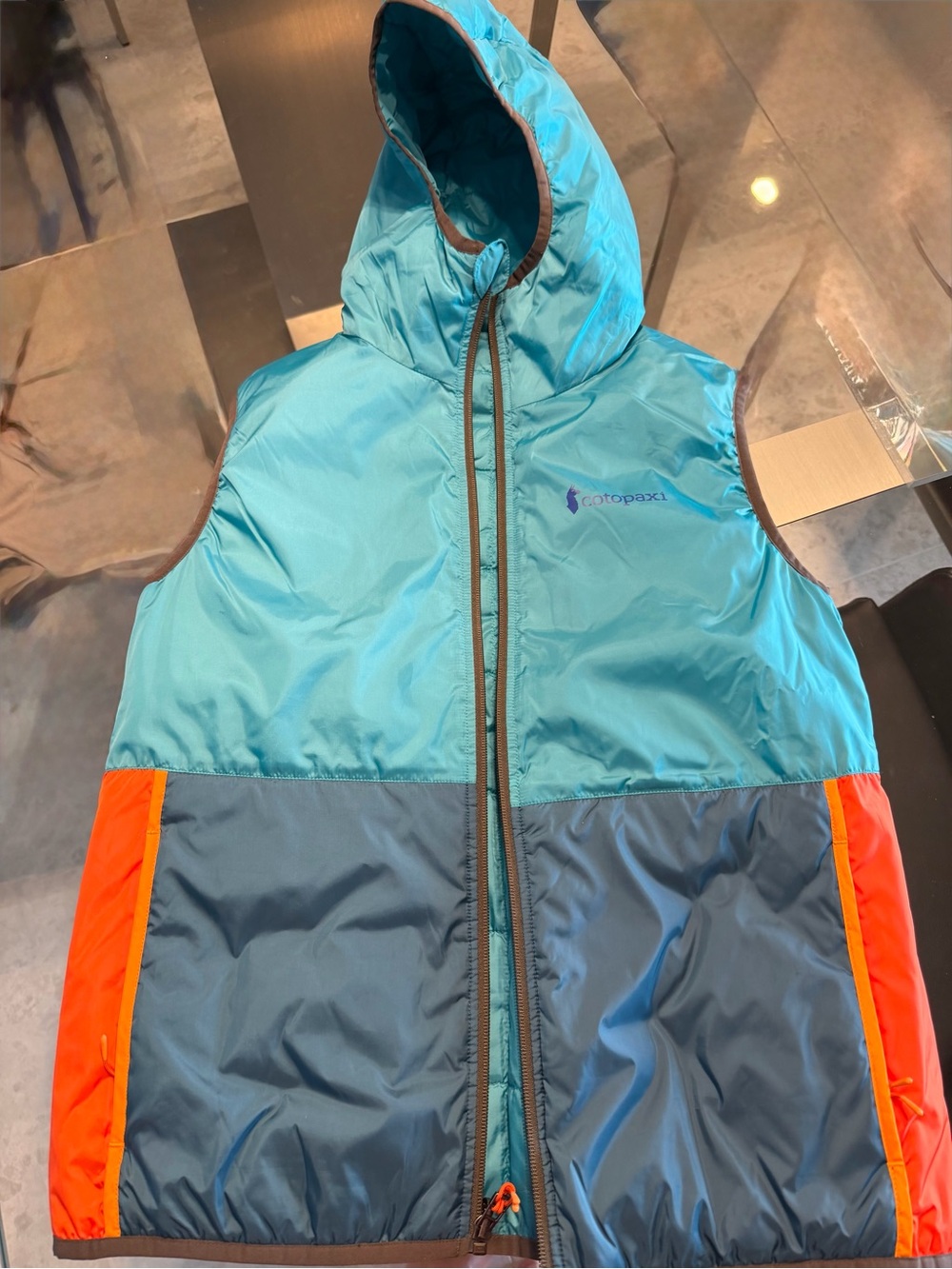 Cotopaxi women’s Teal & orange Hooded Vest